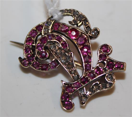 Ruby and diamond monogram brooch, yellow metal setting